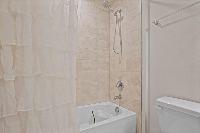 2168 Aibonito Cir, Clermont, FL 34711 - full bathroom featuring shower / bath combo and toilet