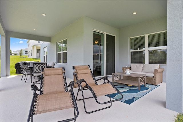 2168 Aibonito Cir, Clermont, FL 34711 - view of patio with outdoor dining space and an outdoor living space