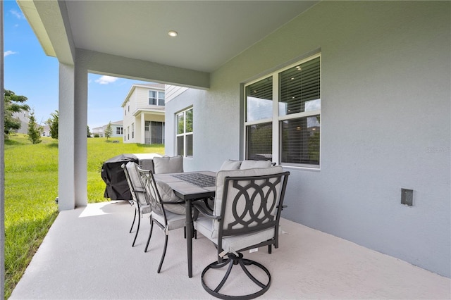 2168 Aibonito Cir, Clermont, FL 34711 - view of patio / terrace featuring outdoor dining space and grilling area