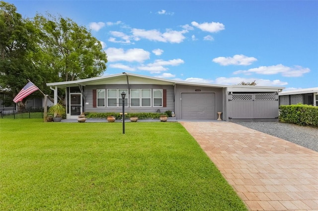 142 Florence Blvd, Debary, FL 32713 - view of front of home featuring a garage and decorative driveway