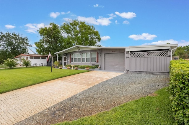 142 Florence Blvd, Debary, FL 32713 - view of front of house featuring a garage, driveway, and a front lawn