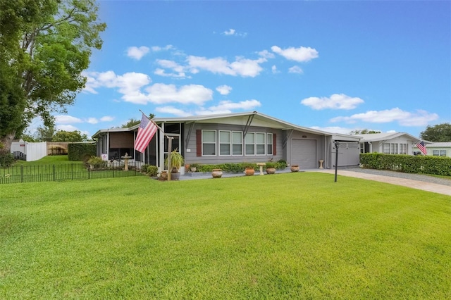 142 Florence Blvd, Debary, FL 32713 - view of front of house featuring a garage, driveway, and a sunroom