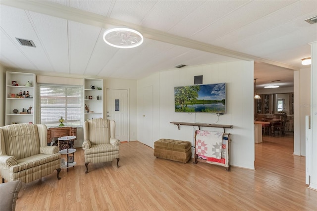 142 Florence Blvd, Debary, FL 32713 - living area featuring wood finished floors and beamed ceiling