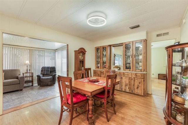 142 Florence Blvd, Debary, FL 32713 - dining space with light wood-style floors