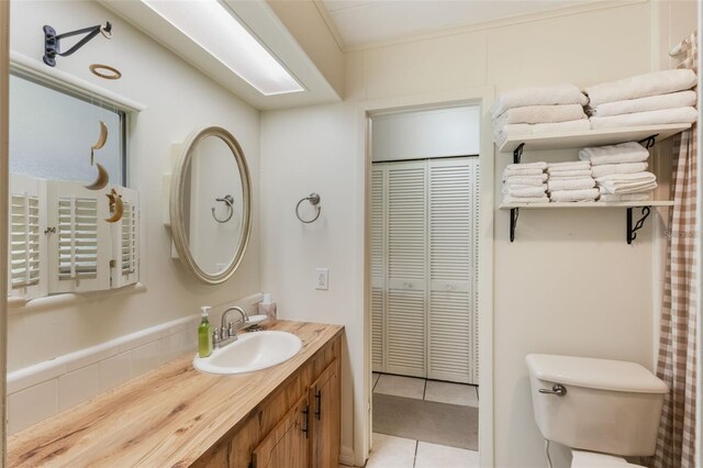 142 Florence Blvd, Debary, FL 32713 - bathroom with a closet, vanity, toilet, and tile patterned flooring