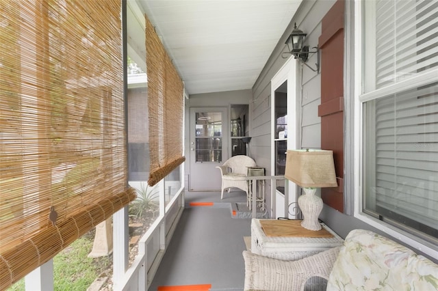 142 Florence Blvd, Debary, FL 32713 - sunroom with healthy amount of natural light and concrete floors