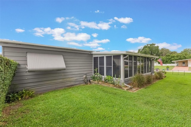 142 Florence Blvd, Debary, FL 32713 - rear view of house featuring a sunroom