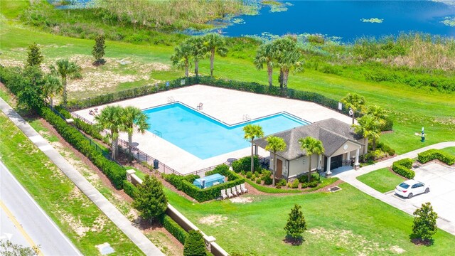 130 Claire Ln, Davenport, FL 33837 - view from above of property with a nearby body of water and a pool area
