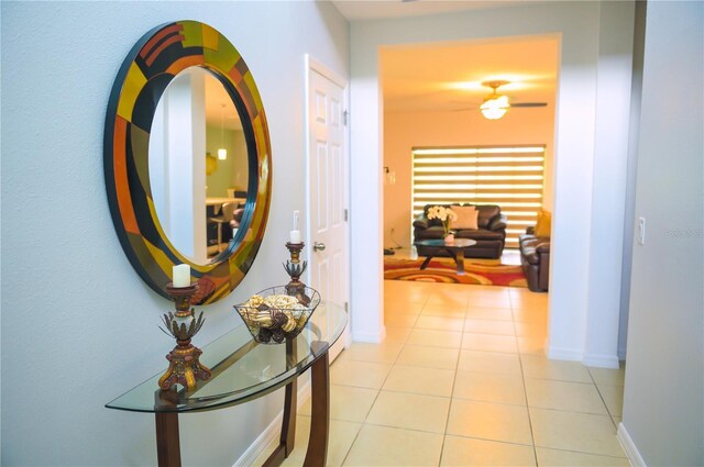130 Claire Ln, Davenport, FL 33837 - hall featuring tile patterned flooring and baseboards