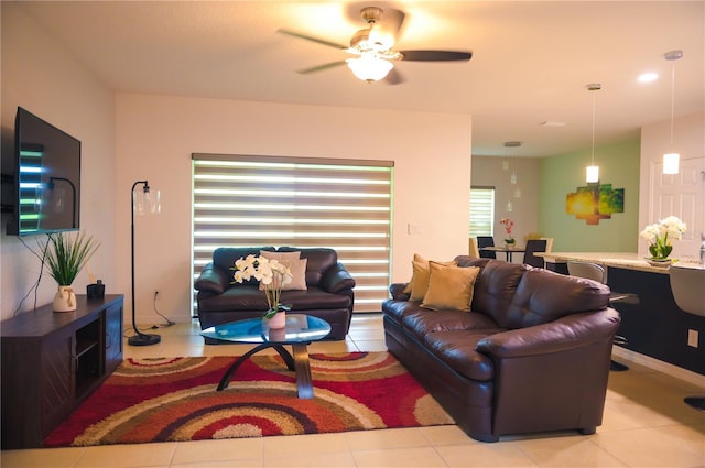 130 Claire Ln, Davenport, FL 33837 - living area featuring a ceiling fan and tile patterned floors