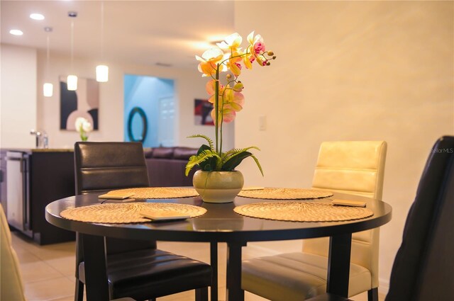 130 Claire Ln, Davenport, FL 33837 - dining room with recessed lighting and light tile patterned floors