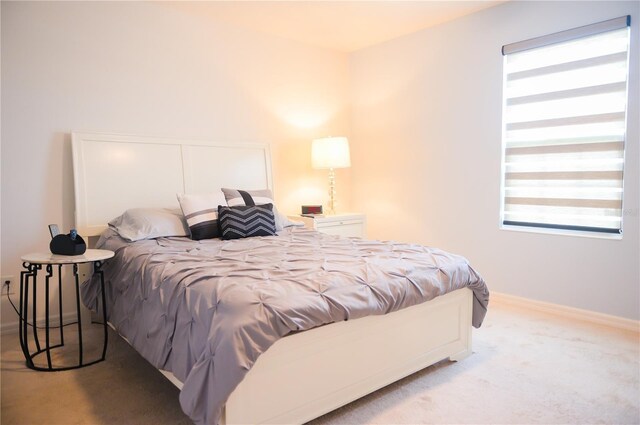 130 Claire Ln, Davenport, FL 33837 - carpeted bedroom with baseboards