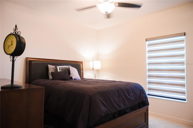 130 Claire Ln, Davenport, FL 33837 - bedroom with light carpet and a ceiling fan