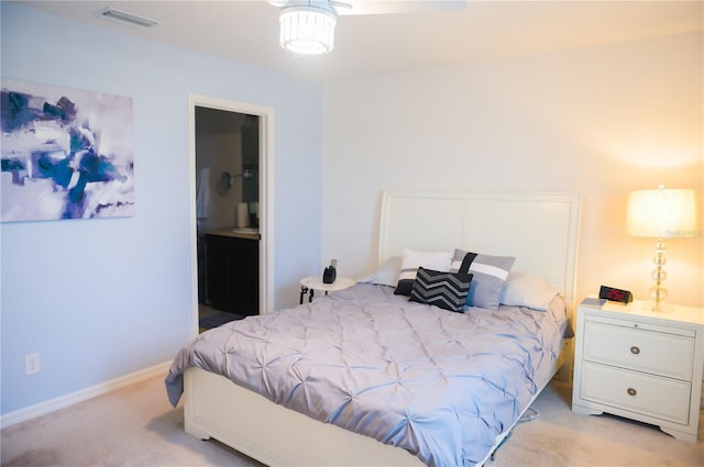 130 Claire Ln, Davenport, FL 33837 - bedroom with light carpet and connected bathroom