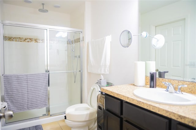 130 Claire Ln, Davenport, FL 33837 - full bathroom featuring vanity, a stall shower, and tile patterned flooring