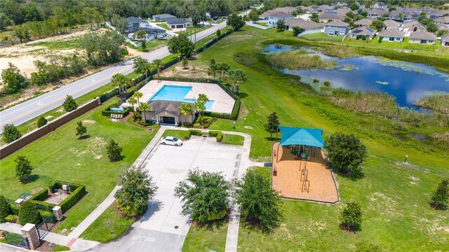 130 Claire Ln, Davenport, FL 33837 - bird's eye view of a nearby body of water and a pool