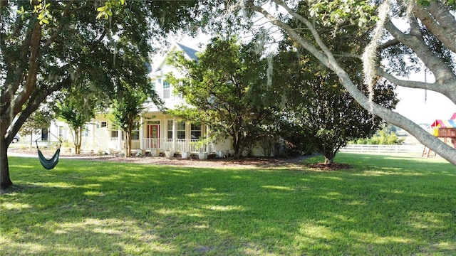 10809 Arrowtree Blvd, Clermont, FL 34715 - view of yard with covered porch