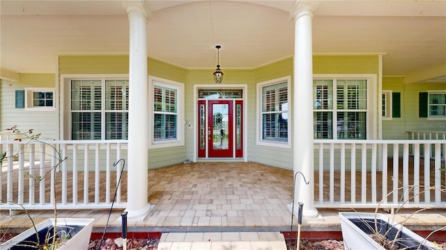 10809 Arrowtree Blvd, Clermont, FL 34715 - doorway to property with covered porch