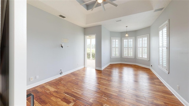 10809 Arrowtree Blvd, Clermont, FL 34715 - spare room featuring ceiling fan, hardwood / wood-style floors, and baseboards