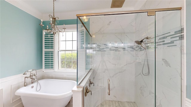 10809 Arrowtree Blvd, Clermont, FL 34715 - full bath featuring a marble finish shower, healthy amount of natural light, a freestanding bath, a chandelier, and a wainscoted wall