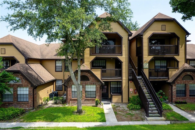 420 Forestway Cir Unit 206, Altamonte Springs, FL 32701 - view of building exterior featuring stairs