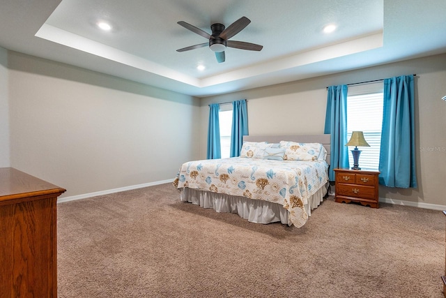 5416 Tessin Trl, Saint Cloud, FL 34771 - bedroom featuring a tray ceiling, baseboards, carpet floors, recessed lighting, and a ceiling fan