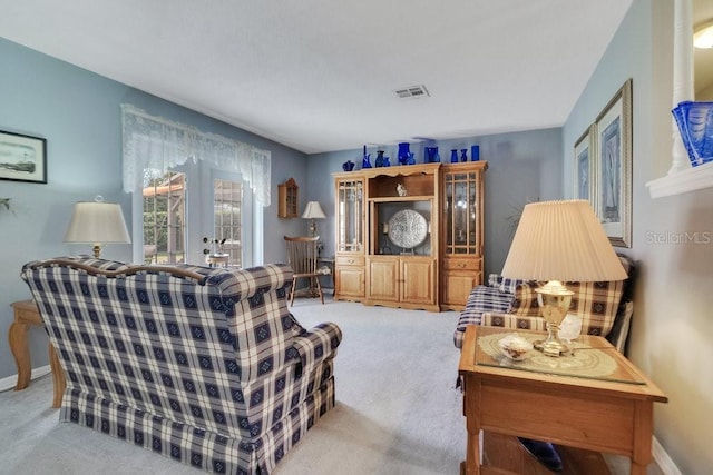 3405 Werber St, Orlando, FL 32806 - carpeted living area featuring baseboards