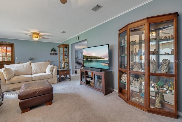 3405 Werber St, Orlando, FL 32806 - living area with ceiling fan, carpet, crown molding, and baseboards