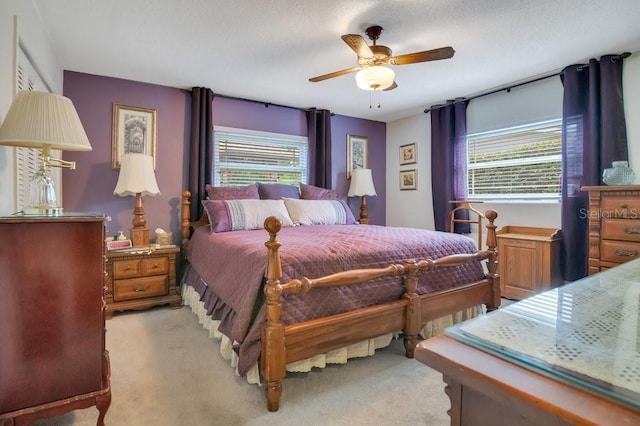 3405 Werber St, Orlando, FL 32806 - bedroom featuring multiple windows, light colored carpet, and ceiling fan