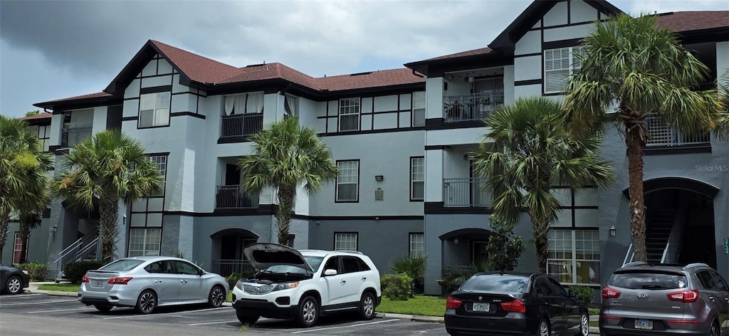 3724 Castle Pines Ln Unit 4234, Orlando, FL 32839 - view of property with uncovered parking
