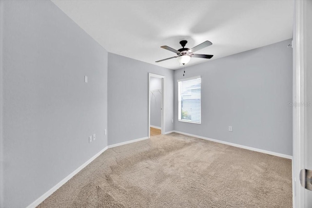 907 Pearly Ridge Ln, Lakeland, FL 33809 - empty room featuring ceiling fan, carpet floors, and baseboards