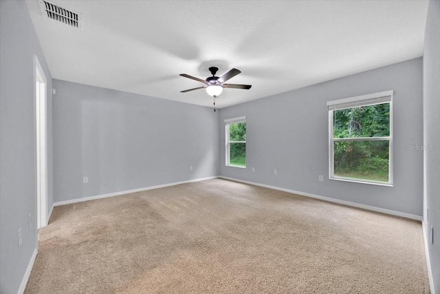 907 Pearly Ridge Ln, Lakeland, FL 33809 - empty room featuring carpet flooring, a ceiling fan, and baseboards