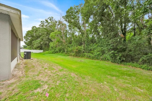 907 Pearly Ridge Ln, Lakeland, FL 33809 - view of grassy yard with central air condition unit