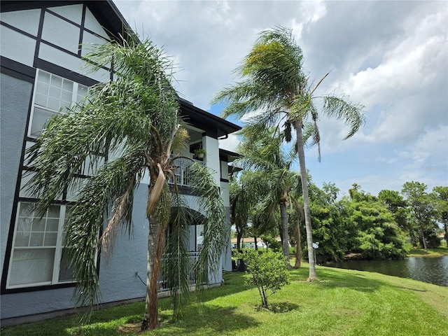 5501 Pga Blvd Unit 4723, Orlando, FL 32839 - view of grassy yard with a balcony and a water view