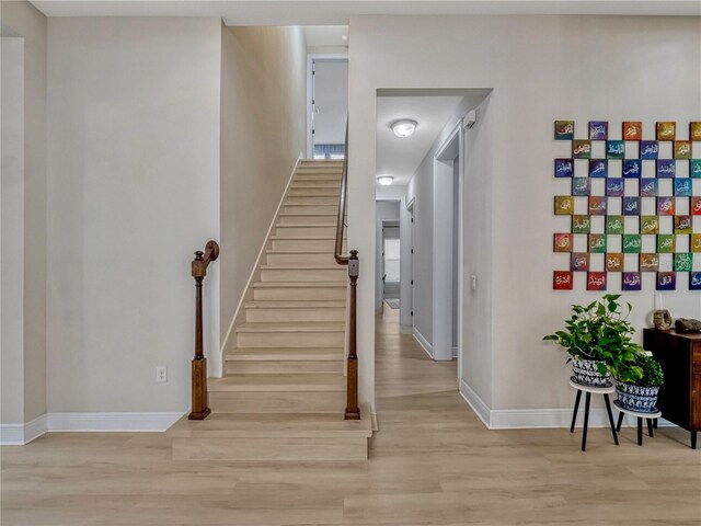 8047 Chilton Dr, Orlando, FL 32836 - stairway featuring wood finished floors and baseboards