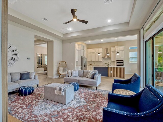 8047 Chilton Dr, Orlando, FL 32836 - living area featuring a ceiling fan, light wood-style floors, baseboards, and recessed lighting