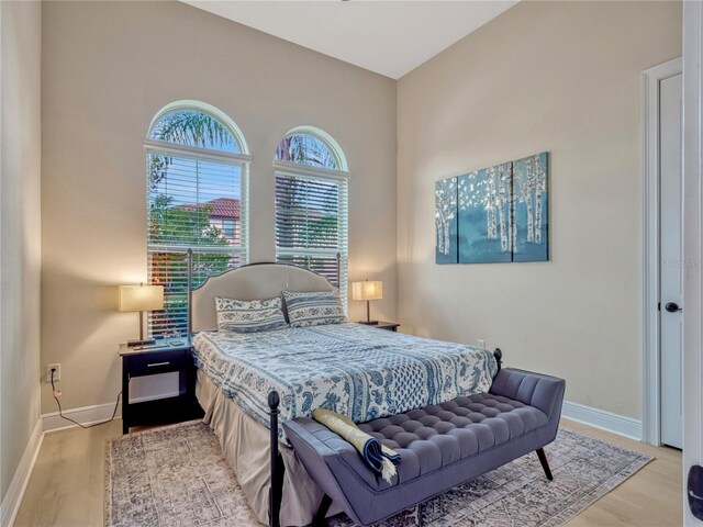 8047 Chilton Dr, Orlando, FL 32836 - bedroom with wood finished floors and baseboards