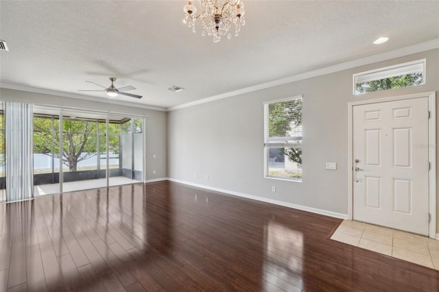 10124 Westpark Preserve Blvd, Tampa, FL 33625 - entryway featuring a ceiling fan, hardwood / wood-style floors, baseboards, healthy amount of natural light, and ornamental molding