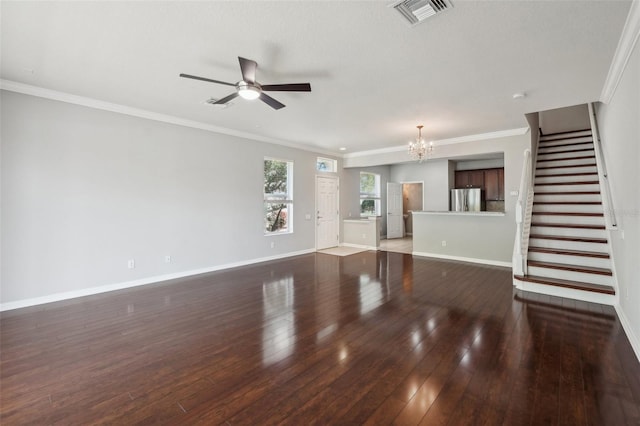 10124 Westpark Preserve Blvd, Tampa, FL 33625 - unfurnished living room with baseboards, a chandelier, hardwood / wood-style floors, stairs, and crown molding