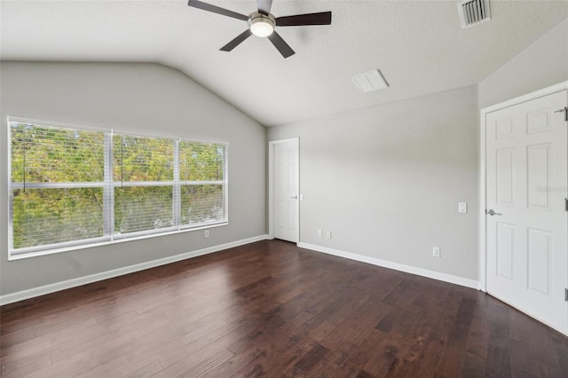10124 Westpark Preserve Blvd, Tampa, FL 33625 - unfurnished bedroom featuring vaulted ceiling, dark wood-style floors, baseboards, and a ceiling fan