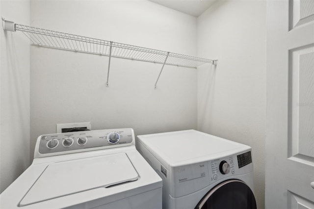 10124 Westpark Preserve Blvd, Tampa, FL 33625 - washroom featuring separate washer and dryer