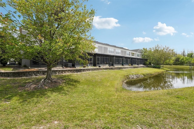 10124 Westpark Preserve Blvd, Tampa, FL 33625 - view of community featuring a water view and a lawn