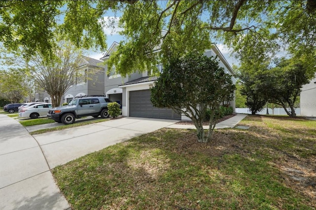 10124 Westpark Preserve Blvd, Tampa, FL 33625 - view of property exterior featuring concrete driveway, a garage, stucco siding, and a lawn