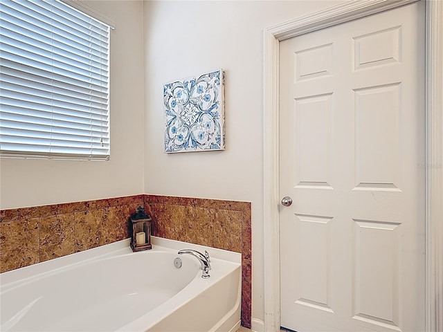 full bathroom with a bath