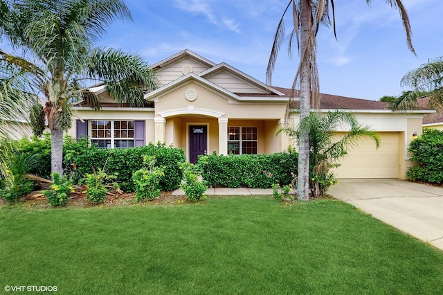 579 Setting Sun Dr, Winter Garden, FL 34787 - view of front facade featuring a garage, concrete driveway, a front yard, and stucco siding