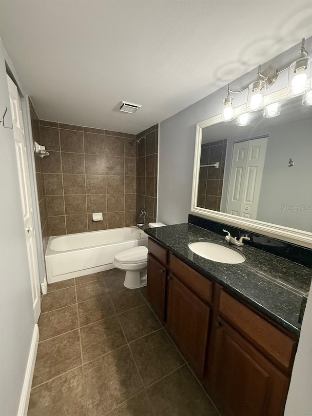 190 Riverbend Dr Unit 102, Altamonte Springs, FL 32714 - bathroom with vanity, tile patterned floors,  shower combination, and toilet