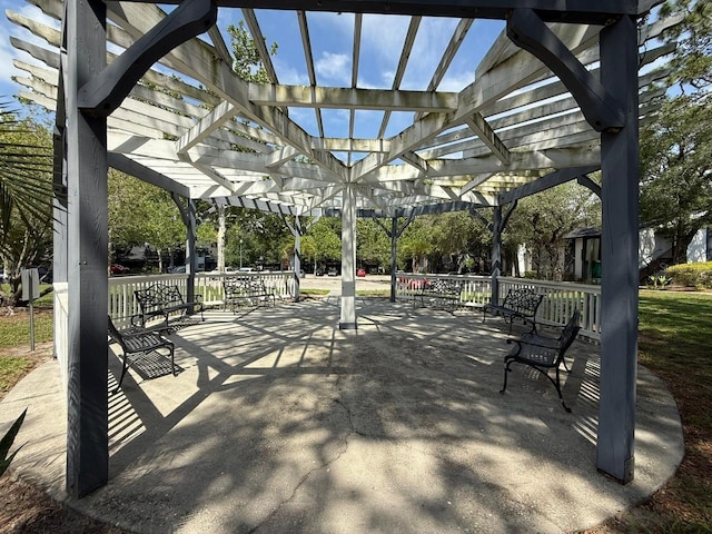 190 Riverbend Dr Unit 102, Altamonte Springs, FL 32714 - view of community featuring a pergola, a patio, and outdoor dining area