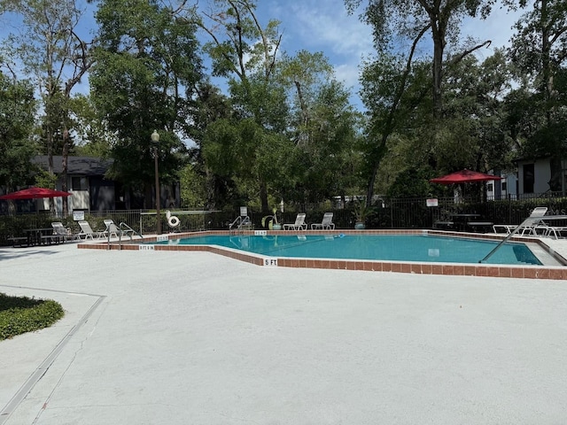 190 Riverbend Dr Unit 102, Altamonte Springs, FL 32714 - community pool featuring a patio area