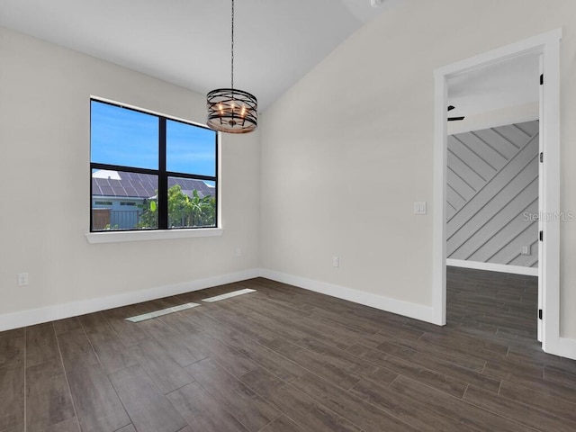 9257 King Hill St, Port Charlotte, FL 33981 - spare room featuring a chandelier and wood finished floors