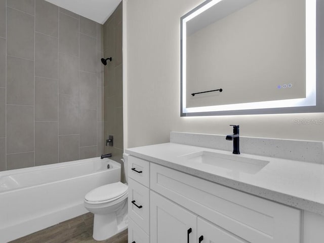 9257 King Hill St, Port Charlotte, FL 33981 - bathroom with vanity, bathing tub / shower combination, and wood finished floors